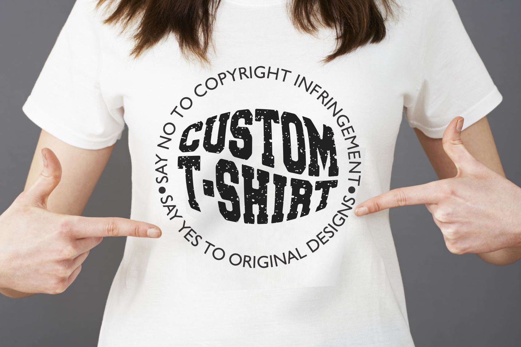 Girl with custom tshirt that says 'Say no to copyrigt infringement, Say yes to custom designs'